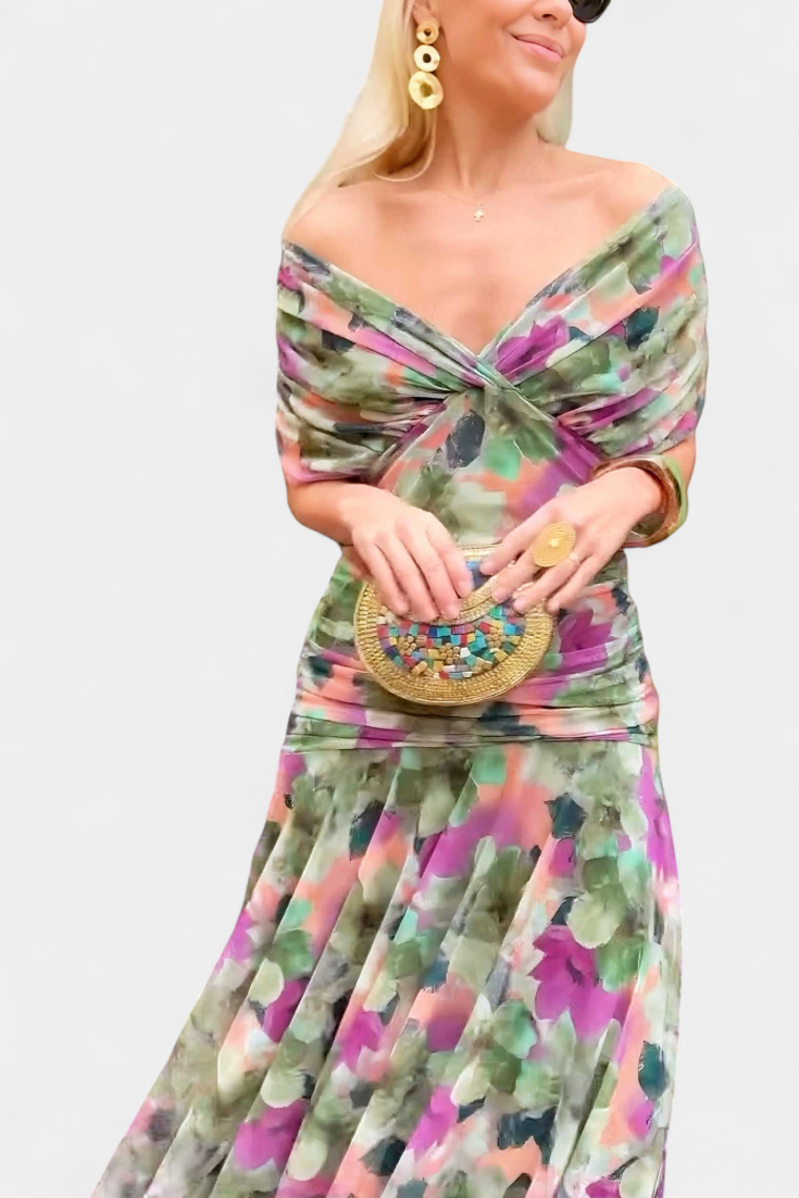 Graceful floral maxi dress, flowy design, off-shoulder.