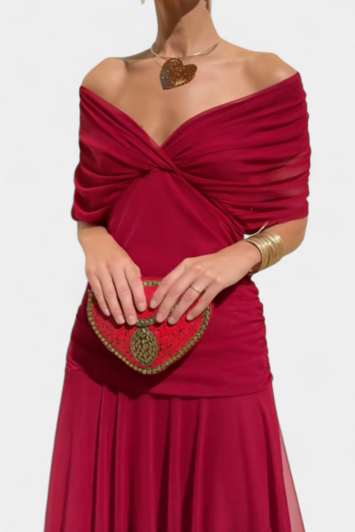 Women's stylish floral maxi dress, off-shoulder silhouette.