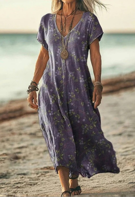 Feminine elegant floral printed midi dress for women, a versatile summer casual or party outfit.