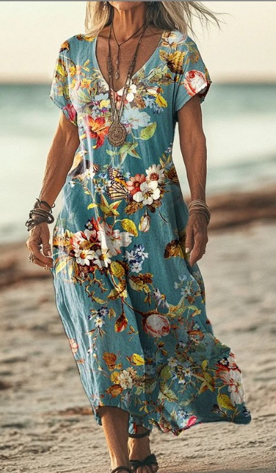 Women's elegant floral midi dress, a beautiful summer sundress design.