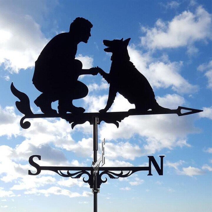 Artistic metal wind vane, a functional and beautiful garden accent.