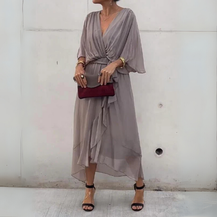Flattering V-neck short-sleeve wrap dress for women, versatile for day or evening wear.