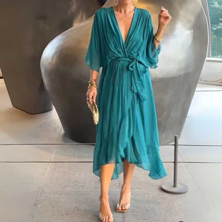 Stylish women's day-to-evening wrap dress, featuring a flattering V-neck and short sleeves.
