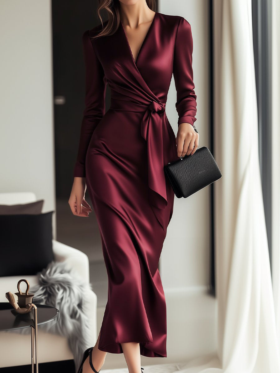 Elegant maroon long sleeve maxi gown for women with cinch waist, perfect for formal events and evening wear.