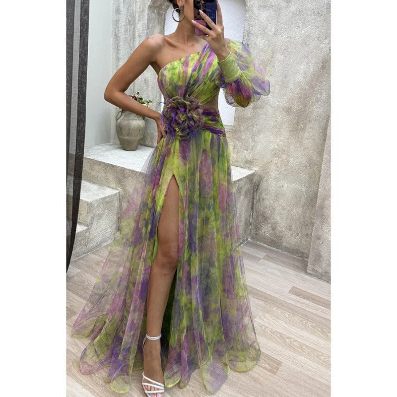 Chic women's elegant sheer floral maxi dress with an asymmetrical neckline, ideal formal wear for evening events.