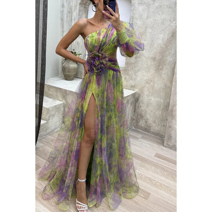 Chic women's elegant sheer floral maxi dress with an asymmetrical neckline, ideal formal wear for evening events.