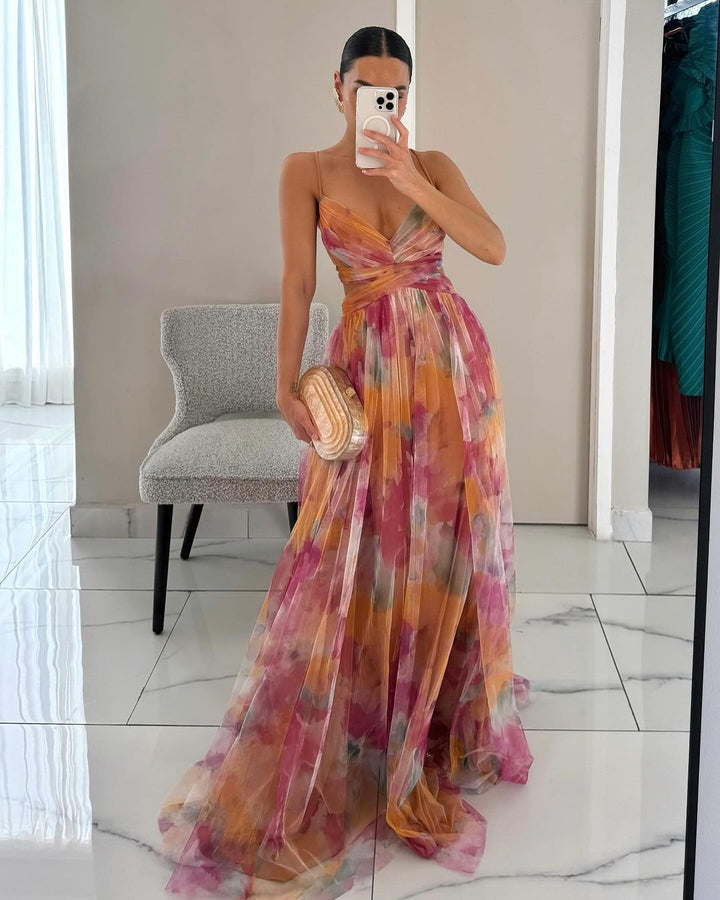 Elegant women's bodycon maxi dress with spaghetti straps, perfect for parties & holidays. Printed mesh fabric.