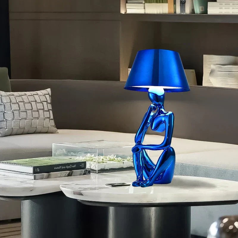 Elegant lighting solution: a modern table lamp in a luxurious gold finish.