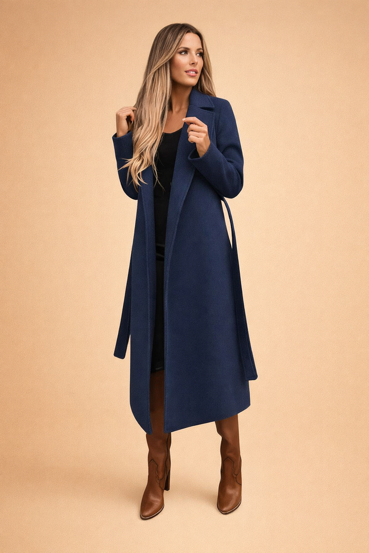 Classic women's warm longline trench coat in navy, elegant and belted for chic winter fashion.