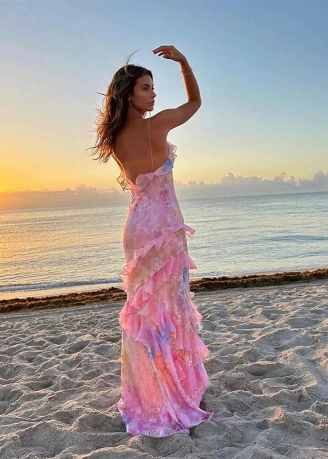Sophisticated floral print maxi dress for women, featuring a flattering silhouette and ruffles.