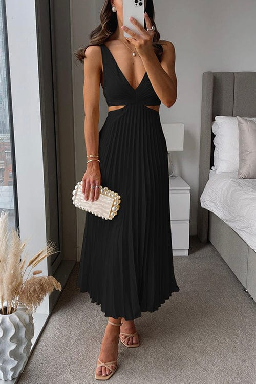 Flowing pleated midi dress for women. Elegant, comfortable occasion wear for summer parties & cocktail events.