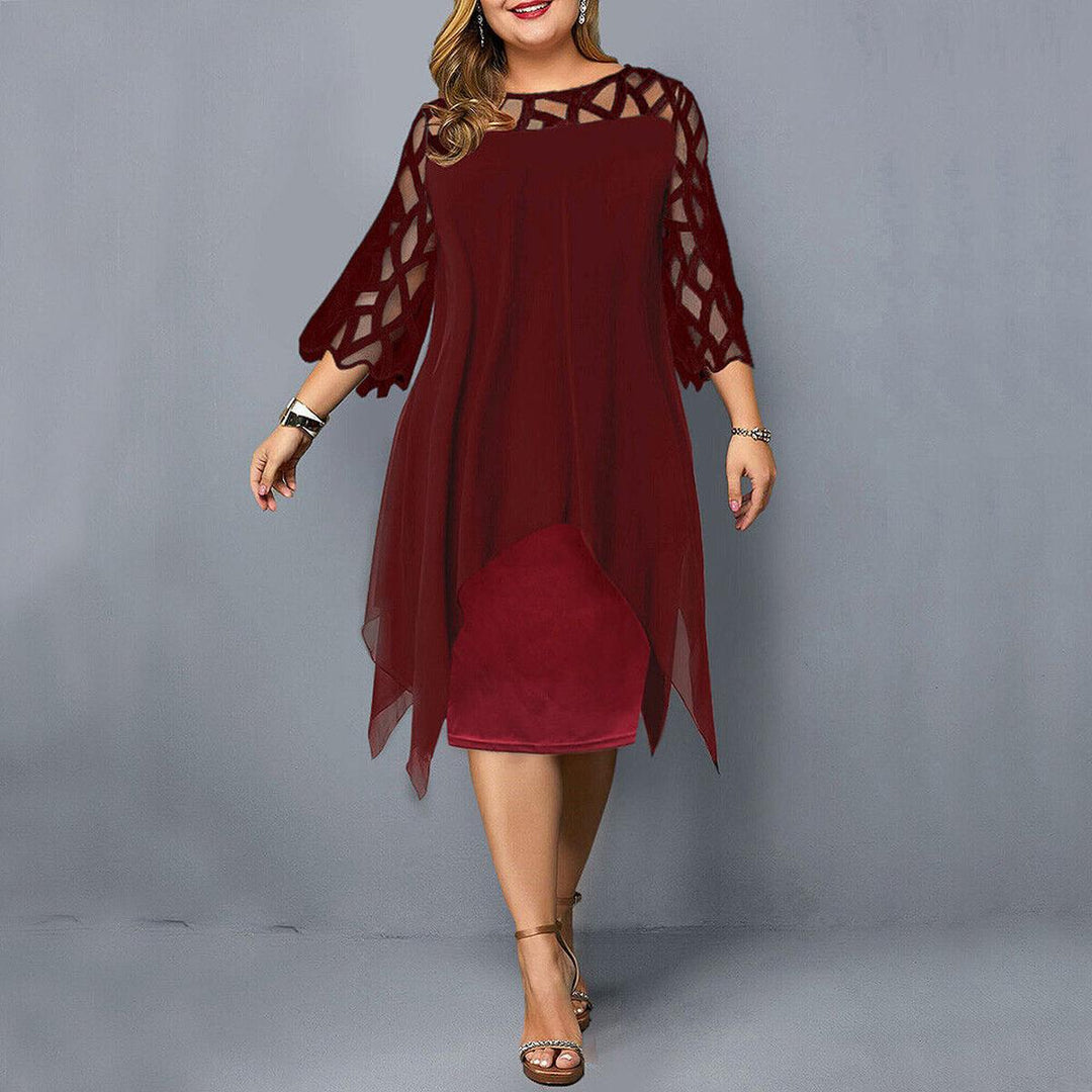Stunning black plus size women's midi dress. Elegant formal wear for evening events, cocktail parties & special occasions.