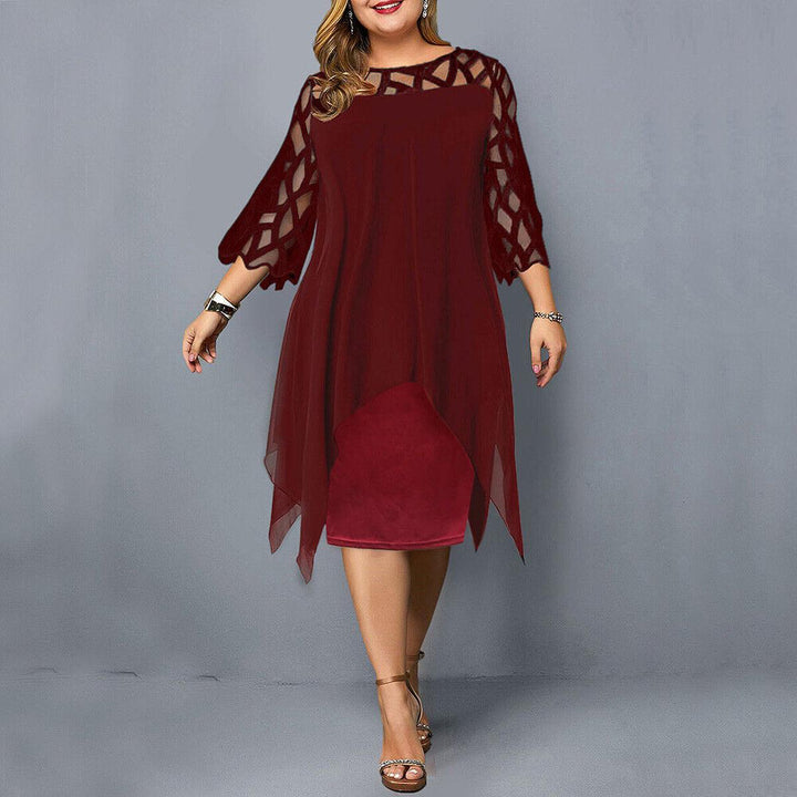 Stunning black plus size women's midi dress. Elegant formal wear for evening events, cocktail parties & special occasions.