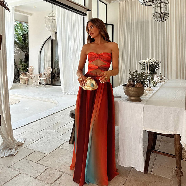 Women's red evening gown featuring a flattering strapless neckline and knot accent.