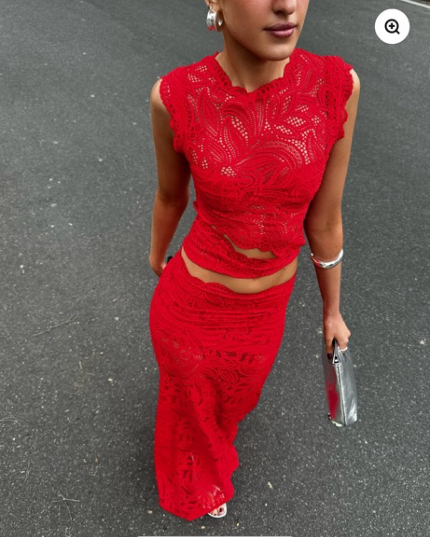 Striking women's red two-piece party outfit. Elegant, sophisticated, and feminine for evening events.