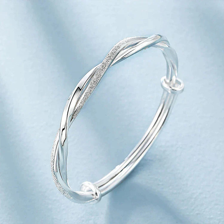 Stunning intricate sterling silver bracelet, offering an elegant and fashionable look for women's jewelry.