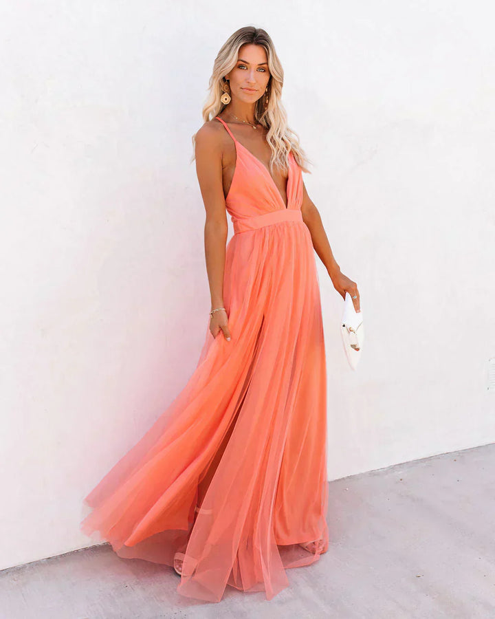 Elegant sleeveless V-neck women's flowy summer maxi evening dress.