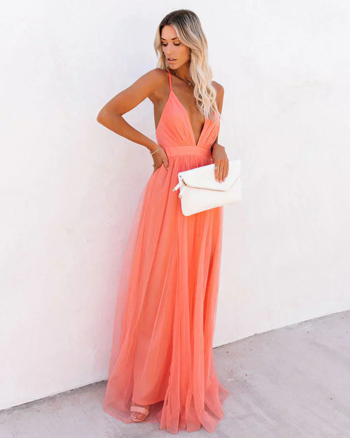Stylish women's fashion: a sleeveless V-neck flowy evening maxi dress.