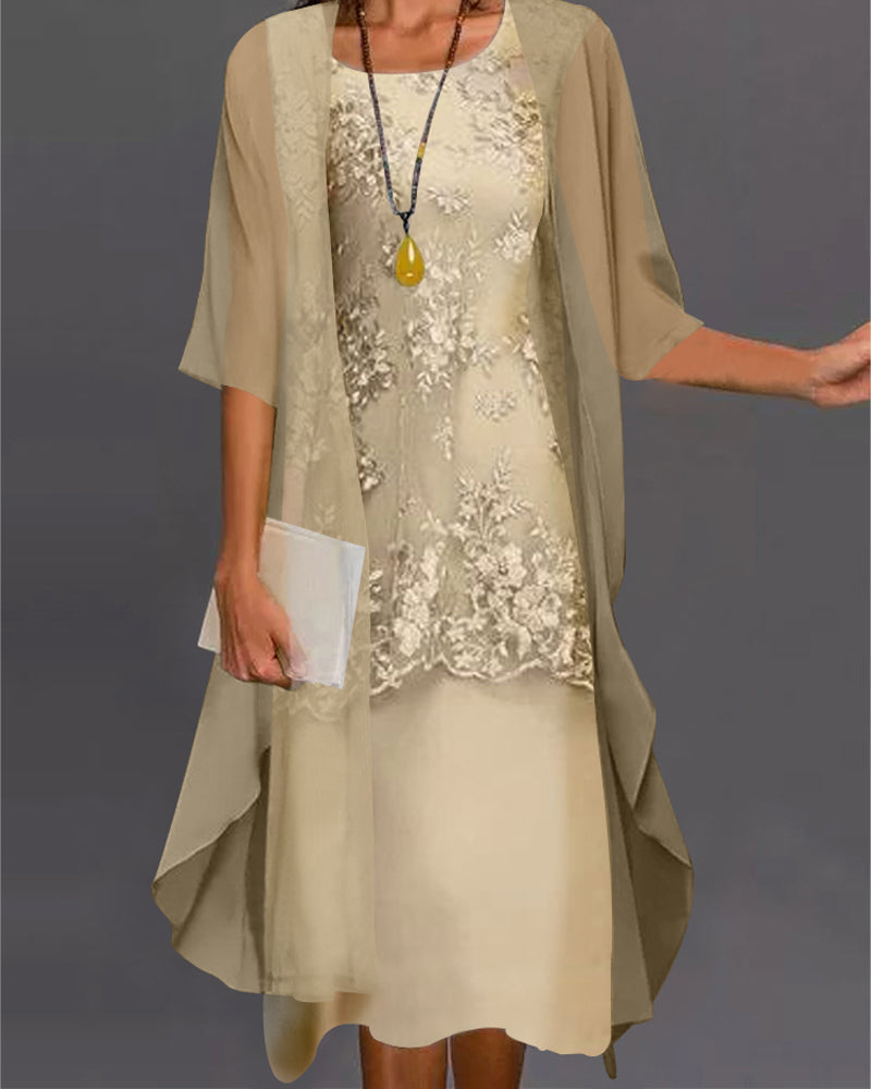 Elegant women's knee-length smock dress with delicate lace patchwork, 3/4 sleeves, and a comfortable loose fit.