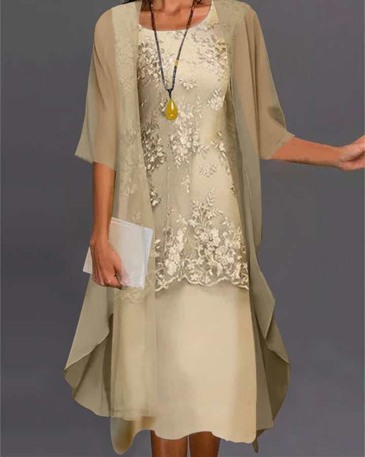 Elegant women's knee-length smock dress with delicate lace patchwork, 3/4 sleeves, and a comfortable loose fit.