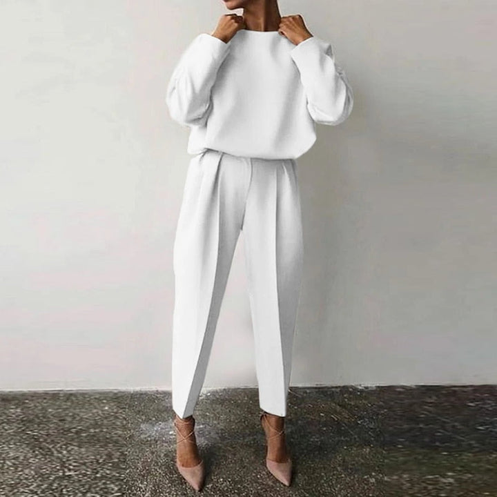 Elegant women's two-piece suit set. Chic and comfortable for business casual or stylish loungewear.