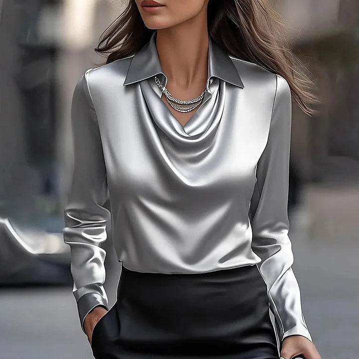 Sophisticated V-neck top, elegant shiny blouse for women's wardrobe.