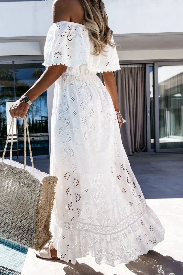 Chic high-low lace dress with off-shoulder neckline, ideal for parties.