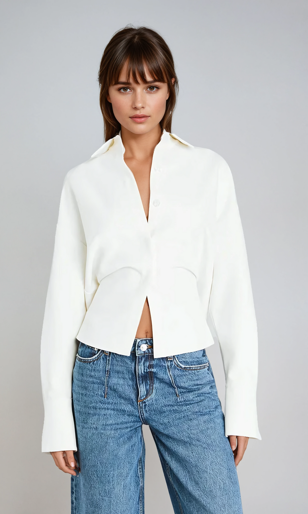 Elegant white long sleeve draped button-down shirt for women, perfect for professional or casual chic wear.