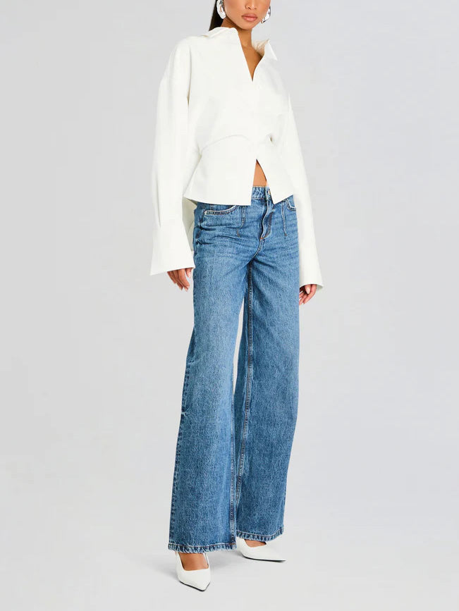 Modern women's elegant draped long sleeve white shirt blouse, a chic and sophisticated button-down for fashion-forward looks.