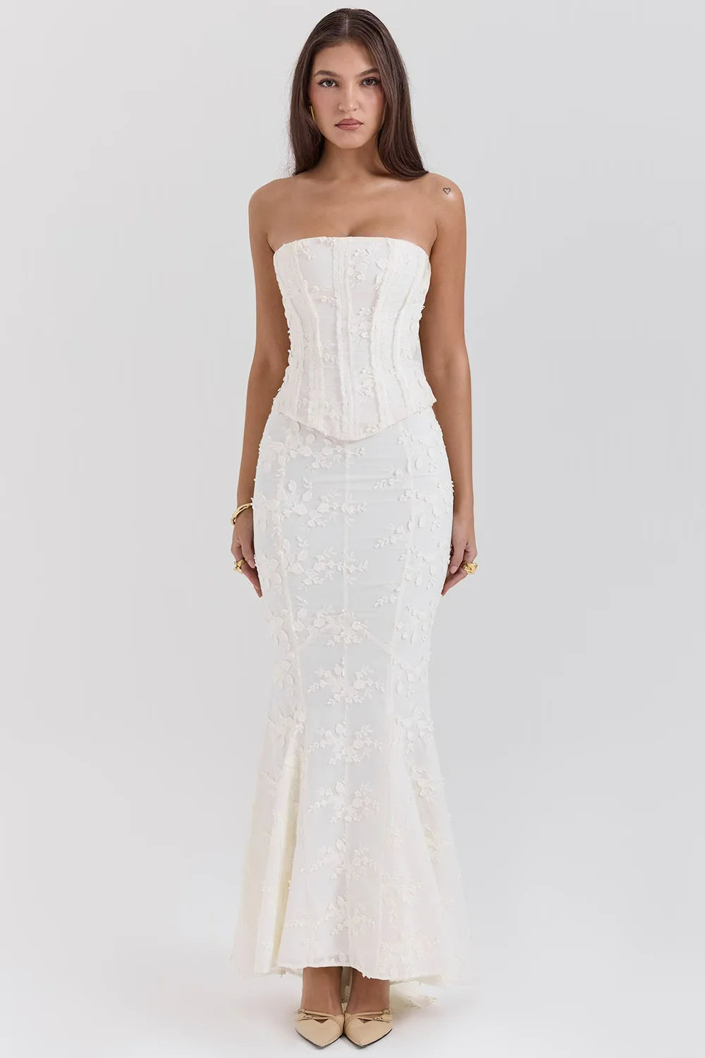 Formal white mermaid maxi dress with intricate embroidery for special occasions.