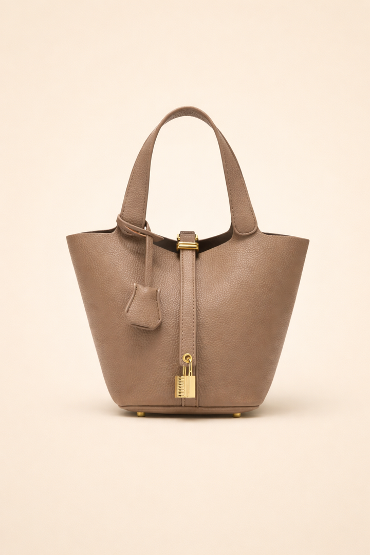 Structured women's fashion handbag, a chic city tote for a polished and sophisticated look.