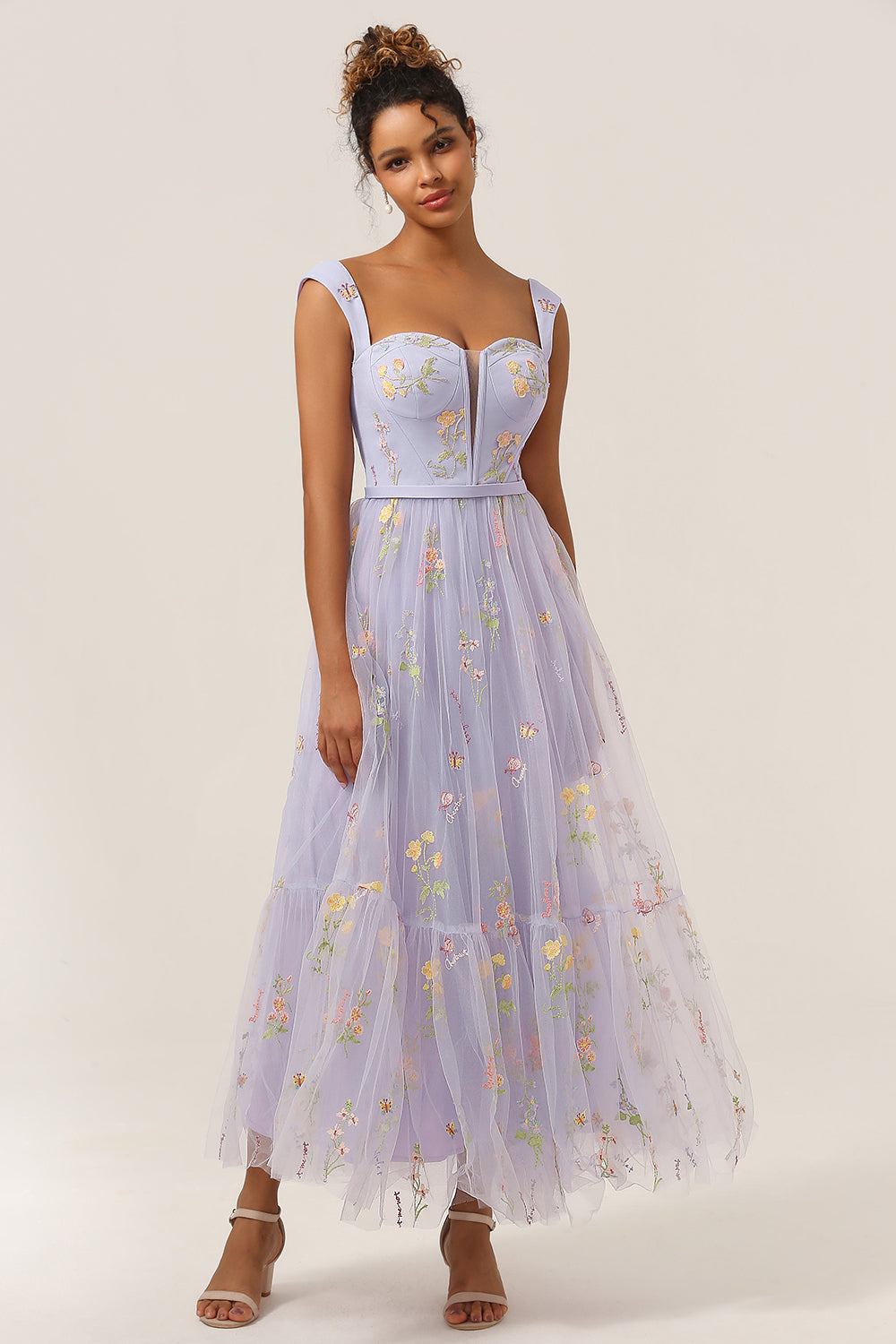 Embroidered A-line formal dress for women, a stylish long ball gown for special occasions.