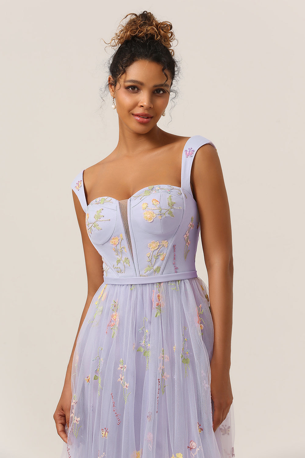 Elegant A-line ball gown for women, exquisitely embroidered, suitable for various formal events.