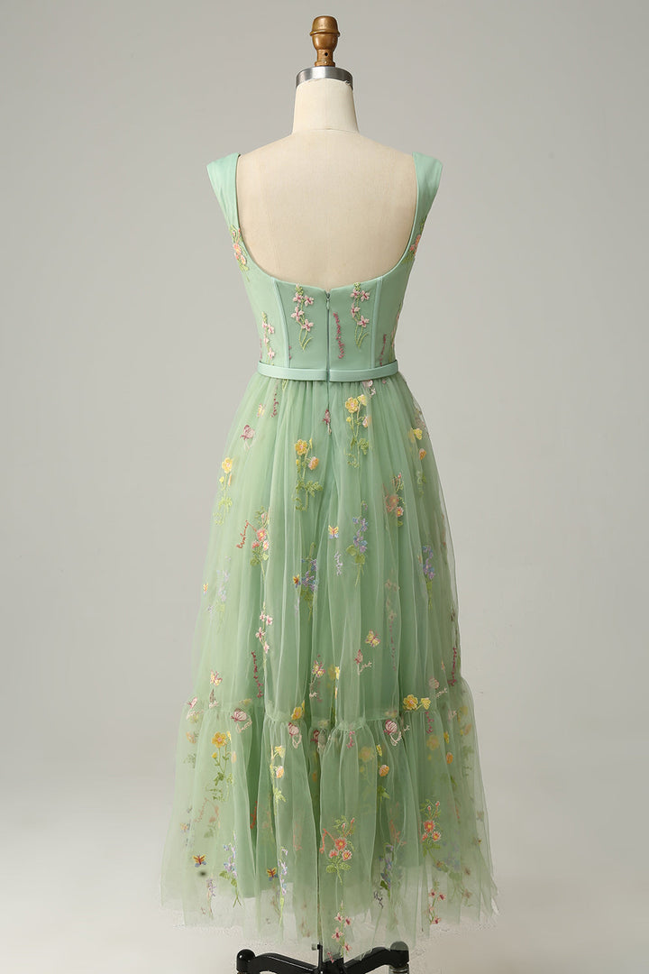 Stylish long A-line ball gown for women, featuring intricate embroidery for special occasions.