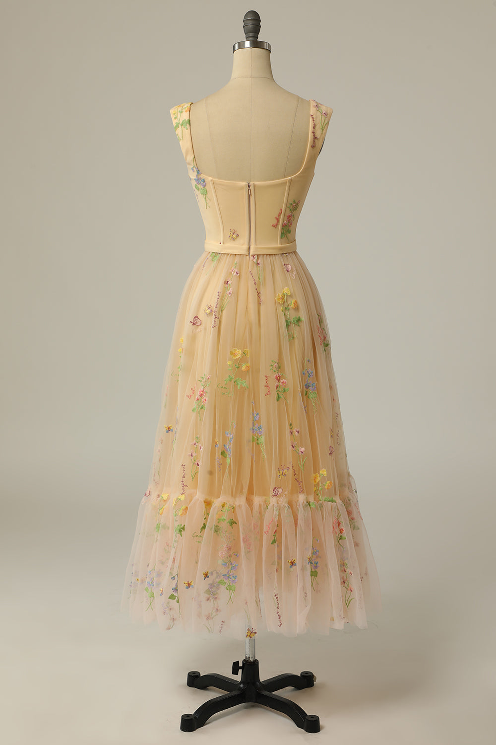 Elegant A-line ball gown, perfect as a women's wedding guest dress with beautiful embroidery.