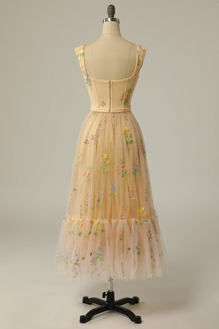 Elegant A-line ball gown, perfect as a women's wedding guest dress with beautiful embroidery.