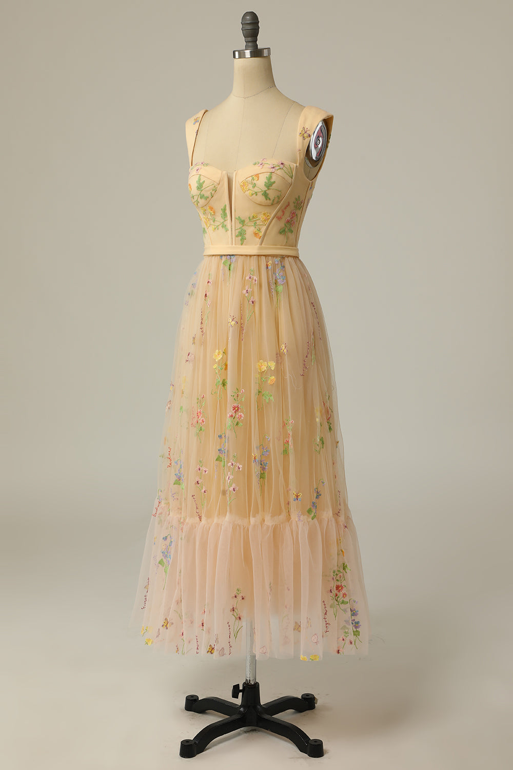 Sophisticated women's A-line ball gown, long and elegantly embroidered for evening wear.
