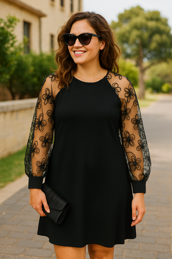 Elegant women's A-line formal dress with sheer embroidered sleeves, perfect for evening occasions.