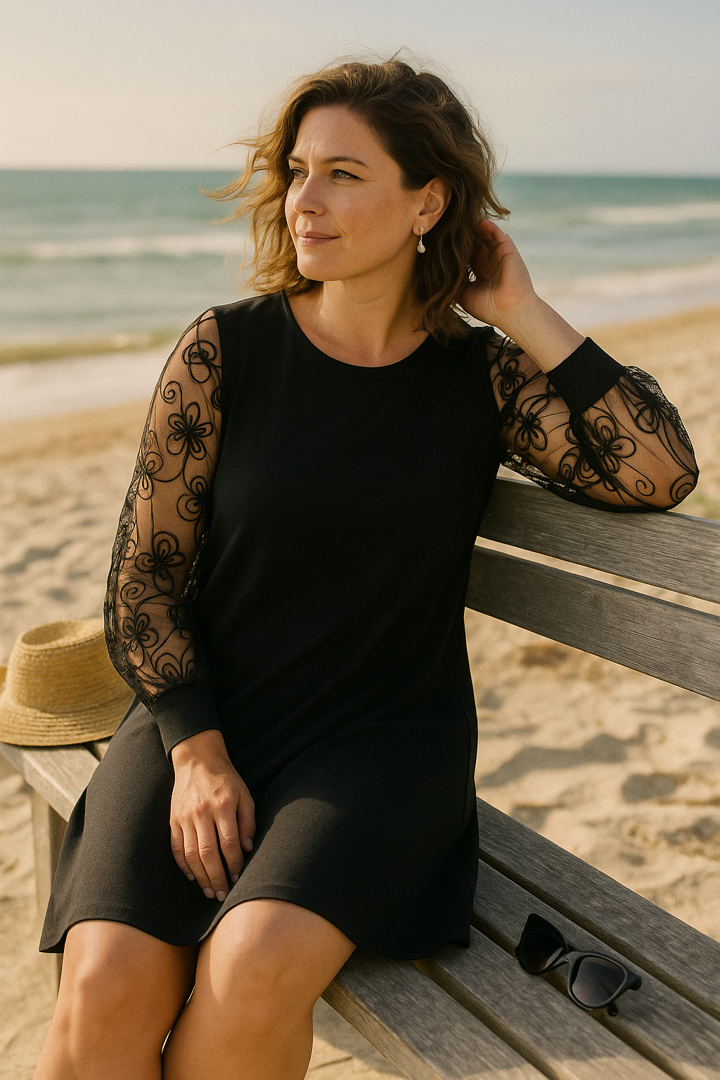 Flattering women's A-line cocktail dress featuring elegant sheer embroidered sleeves and a modest fit.