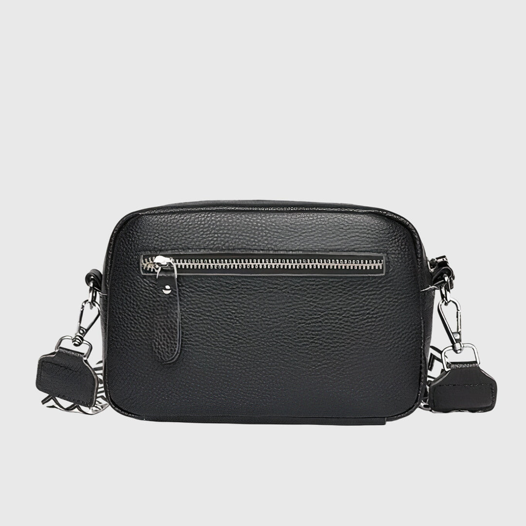 Stylish women's versatile leather shoulder bag in a rich brown hue, ideal for everyday carry & fashion.