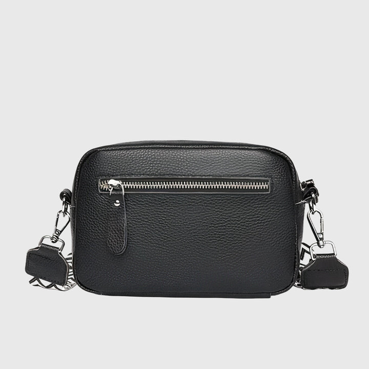 Stylish women's versatile leather shoulder bag in a rich brown hue, ideal for everyday carry & fashion.