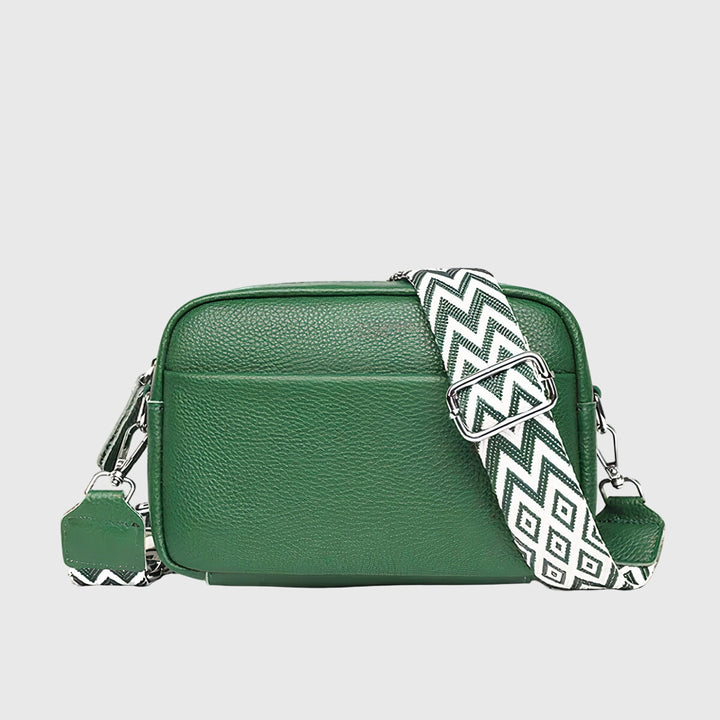 Sophisticated women's black leather handbag, a stylish and elegant shoulder bag that complements any outfit.