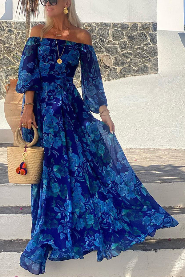 Elegant women's blue floral off-shoulder maxi dress, perfect for summer vacations or sophisticated casual style.