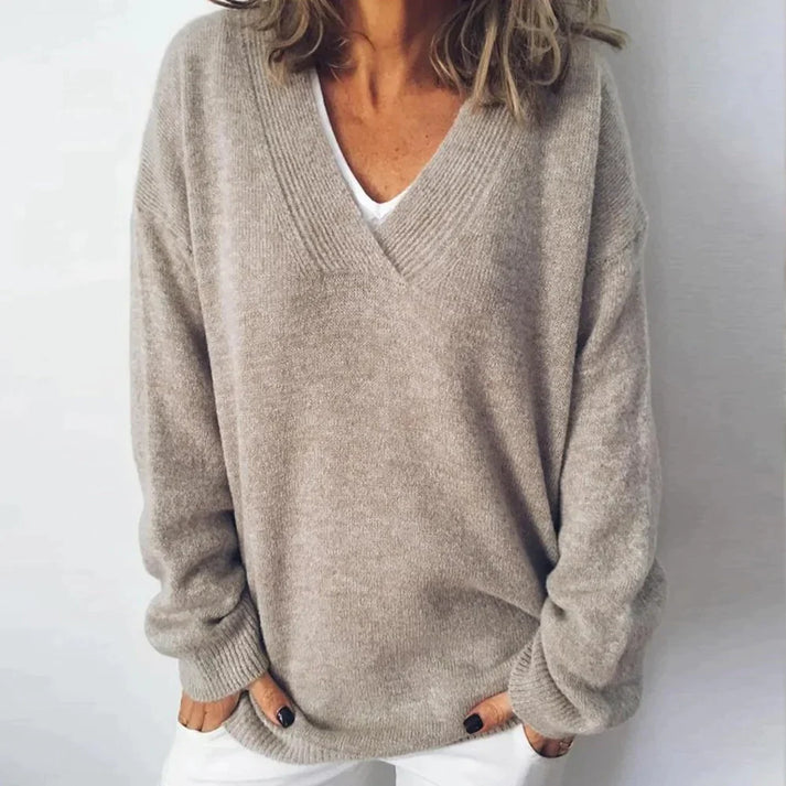 Elegant women's cashmere v-neck jumper in a soft, cozy knit. A versatile wardrobe essential.