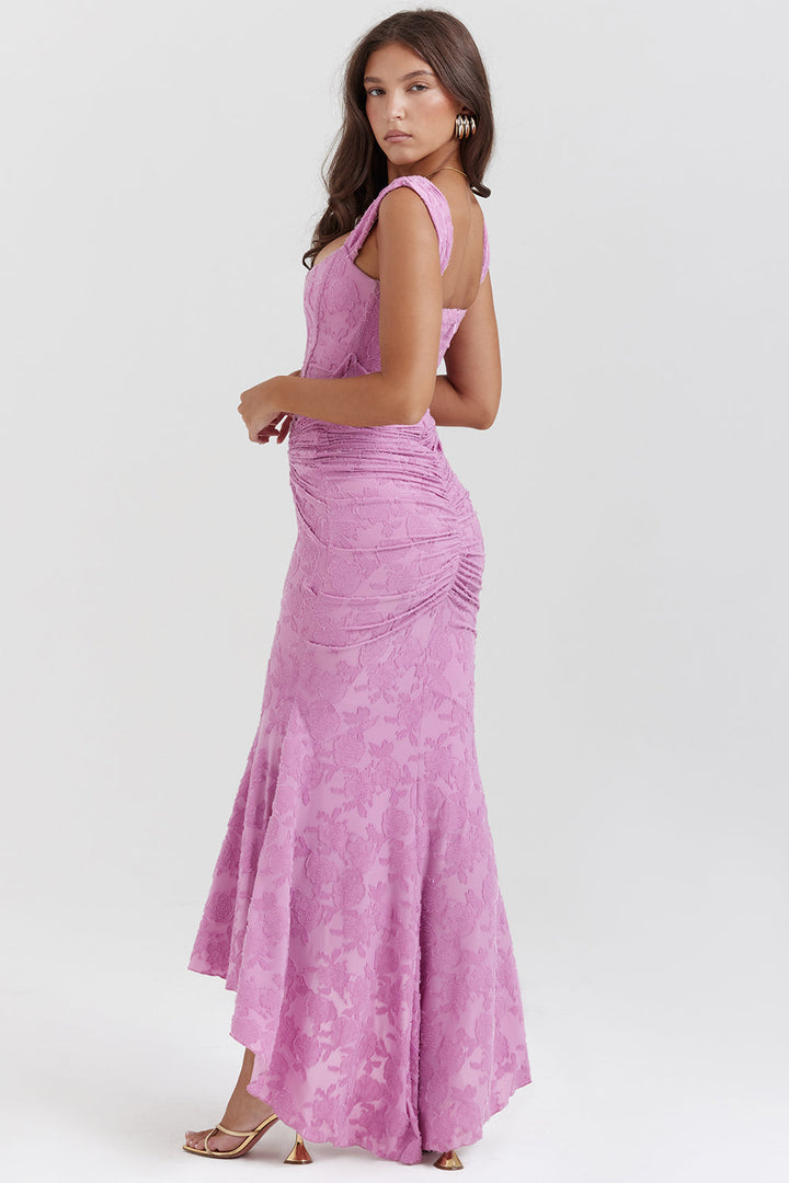 Back view of an elegant women's maxi dress with intricate ruching & corset, ideal for formal events.