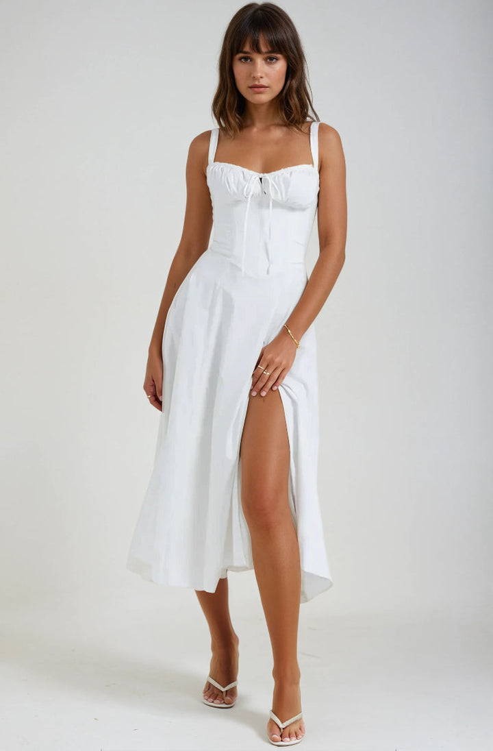 Feminine flared midi occasion dress with elegant corset detailing.