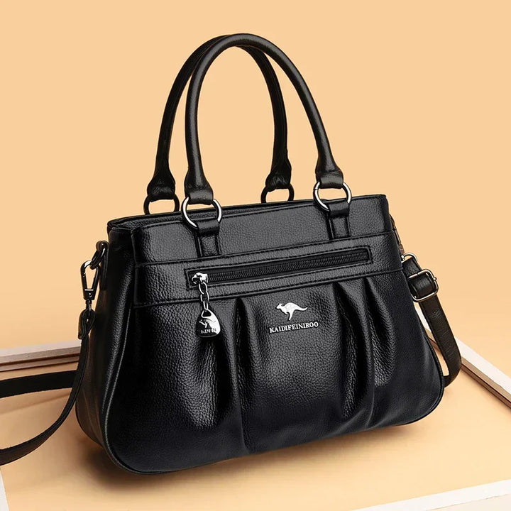Elegant women's faux leather shoulder bag with a classic design, perfect for work or daily fashion.