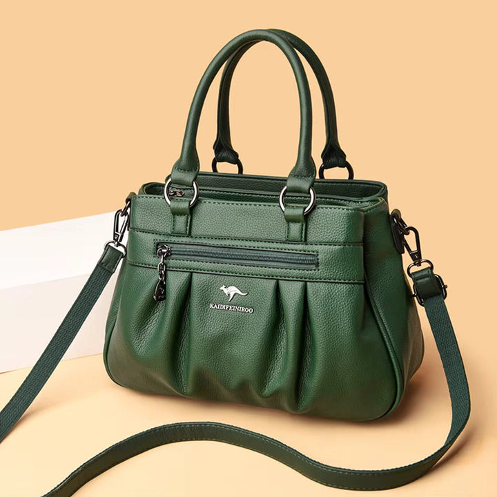 Chic faux leather women's shoulder bag, an elegant vegan crossbody perfect for daily use & professional style.