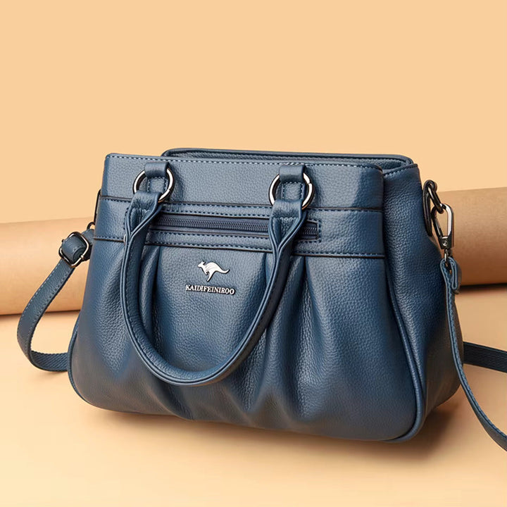 Women's elegant vegan leather shoulder & crossbody bag, a classic style daily essential and fashion accessory.