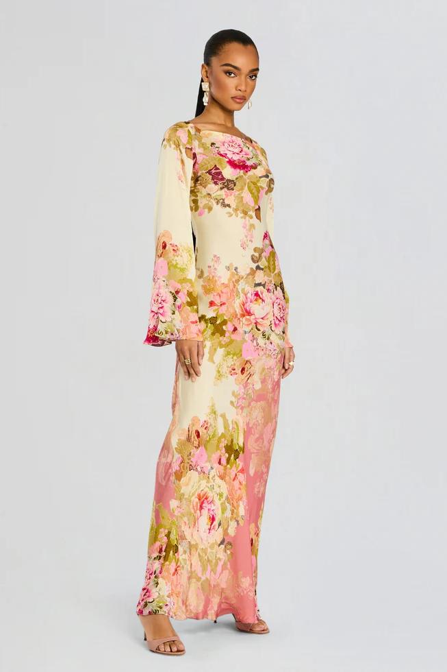 Stylish floral maxi dress with flowing bell sleeves, ideal for weddings or parties.